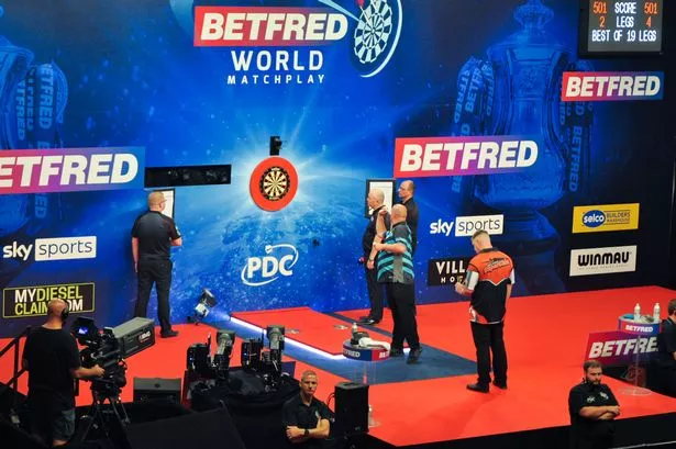 “PROFESSIONAL DARTS PLAYER’S CAREER ENDS IN SHAME AS HE FAILS TO HIT A SINGLE DOUBLE IN 12 MATCHES, FORCING HIM TO SELL HIS DARTS TO BUY THERAPY SESSIONS TO OVERCOME ‘TRIPLE 20’ INDUCED TRAUMA